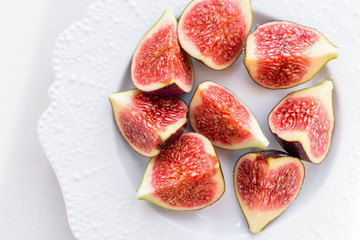 chopped figs on a white ceramic plate