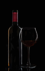 bottle of wine with a glass
