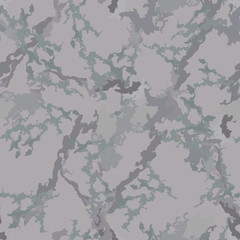 Urban camouflage of various shades of beige, green and grey colors