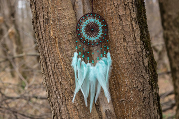 Handmade dream catcher with feathers threads and beads rope hanging