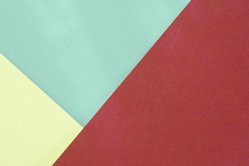 Green bordo paper background. Geometric figures, shapes. Abstract geometric flat composition. Empty space on monochrome cardboard