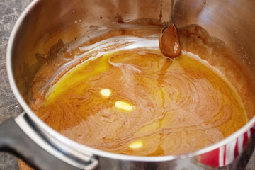Do it yourself: Gingerbread cookies tutorial. Step by step recipe. Step 08. Stir in cold butter untill melted