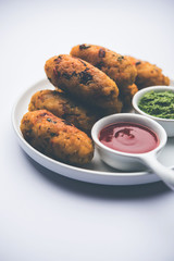 Veg Poha Roll made using flattened Rice, served with tomato ketchup and green chutney