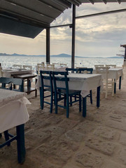 Sea view restaurant, blue and white wooden chair