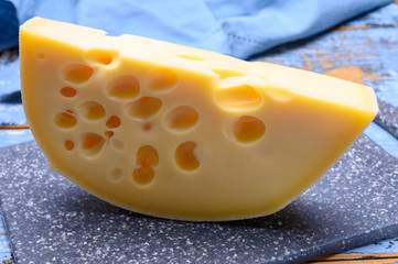 Cheese collection, french hard cheese with holes emmentaler