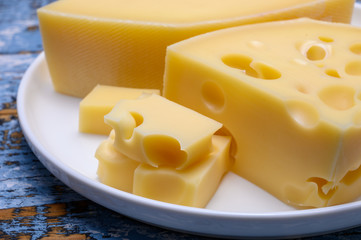 Cheese collection, french hard cheese with holes emmentaler