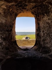 window, castle, stone, old, wall, architecture, landscape, ancient, arch, nature, sea, sky, blue, ruins, travel, rock, view, door, medieval, ruin, fort, building, tunnel, gate, church