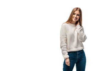 Obraz premium attractive happy in jeans and white sweater, isolated on white