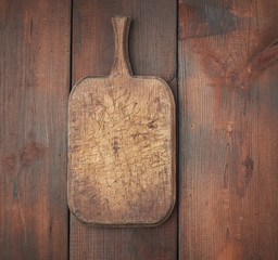 very old empty wooden rectangular cutting board, top view