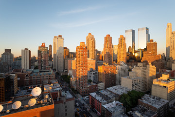 Hell's Kitchen panorama skyline and the 8th Avenue at sunset, Midtown Manhattan, New York City