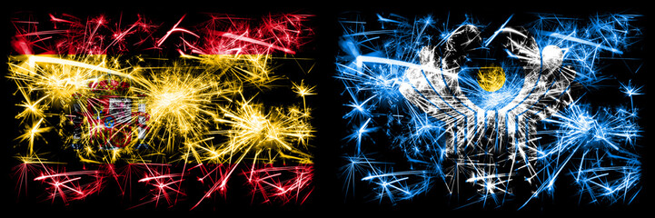 Spanish vs Commonwealth New Year celebration sparkling fireworks flags concept background. Combination of two abstract states flags.
