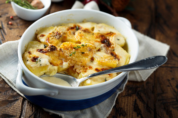 Homemade potato gratin with cream and cheese