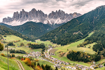 Fototapeta na wymiar Overlooking the village of Santa Maddalena and the Villnoess valley with the Geisler massif in the background