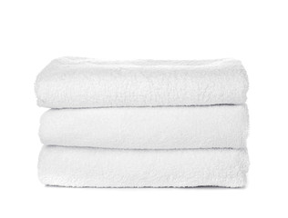 Stack of clean towels isolated on white