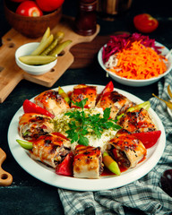 turkish beyti kebab served with yogurt, pepper and tomato