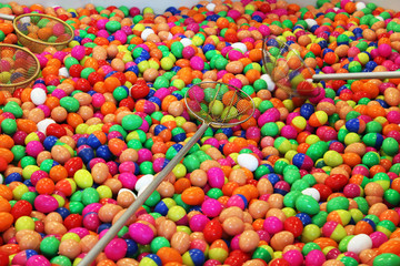 Fototapeta na wymiar Colorful plastic eggs for lucky game