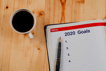 2020 goals plan list on book note ,Business plan.