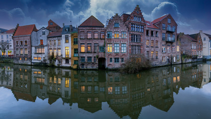 Picturesque medieval buildings on Leie river in Ghent town, Belgium, Europe.