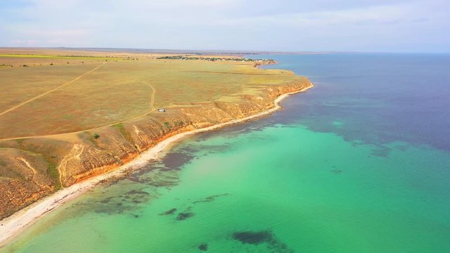 Aerial view of wild beach, jungle and long coastline. Beautiful wild beach krym