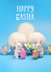 Happy Easter. two hares toy and egg. Easter holiday background, spring season. Easter decoration with rabbits and eggs, Easter idea, minimal style concept. Close up. soft selective focus