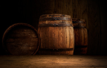 Old wooden barrel on a brown background