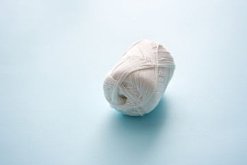 Wool on a Sky blue background.