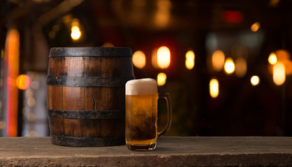 Old wooden barrel on a brown background