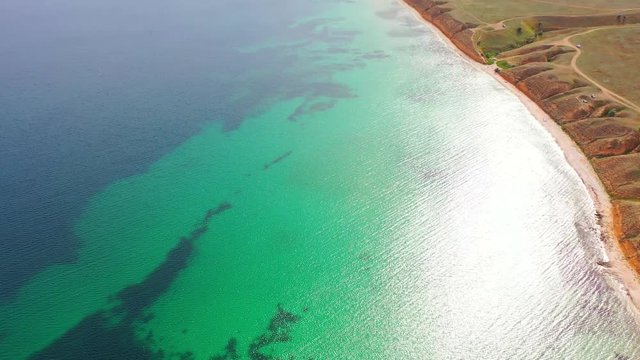 Aerial view of wild beach, jungle and long coastline. Beautiful wild beach krym