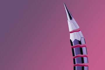 Lead pencil effectively cut into several parts horizontally. Slice effect. Creative concept of drawing, learning, sketch. Gradient background in pink and lilac pastel colors. Minimalism.
