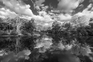 Fototapeta premium Lake reflection in autumn forest