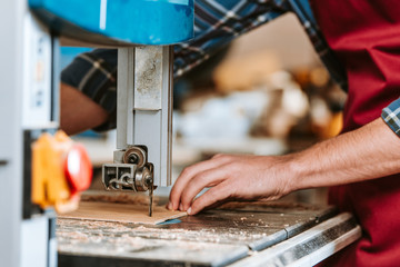 selective focus of carpenter using electric woodworking
