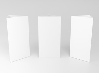 Promotional table talker isolated on white background with clipping path, mockup template paper tri-fold vertical triangle cards with reflections. white sheets front & left and right view. 3d render