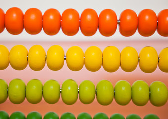 Fototapeta premium Colorful children's wood abacus toy. Close up.