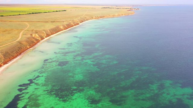 Aerial view of wild beach, jungle and long coastline. Beautiful wild beach krym