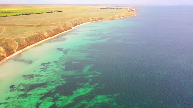 Aerial view of wild beach, jungle and long coastline. Beautiful wild beach krym