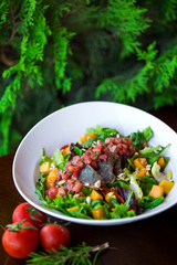 a bowl of vegetable salad with pistachio