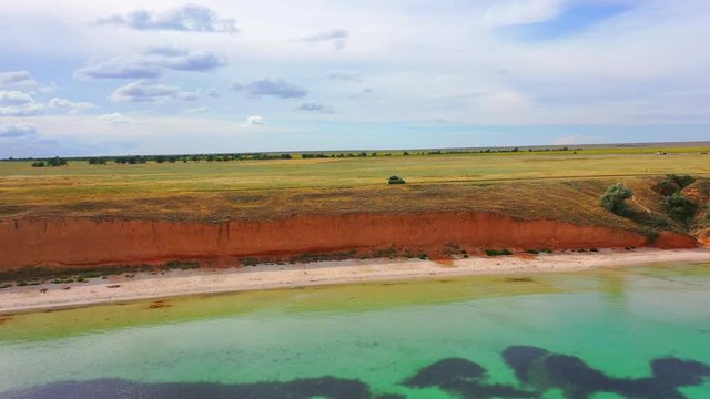 Aerial view of wild beach, jungle and long coastline. Beautiful wild beach krym