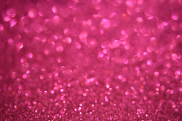 Beautiful Abstract Sparkle Glitter Lights Background. Bright Pink Fuchsia. Shine Bokeh Effect. For party, holidays, celebration.