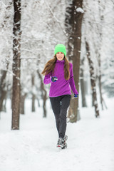 Winter running, exercise woman. Healthy lifestyle 