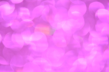 Beautiful Abstract Defocused Sparkle Glitter Lights Background. Bright Pink Fuchsia. Shine Bokeh Effect. For party, holidays, celebration.