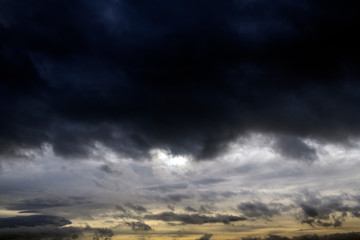 Obraz na płótnie Canvas Grey clouds are covering blue sky. 