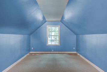 Empty attic bedroom or spare room.