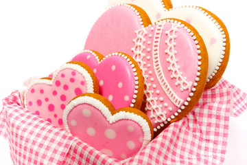 Set of pink heart shaped cookies with patterns, handmade