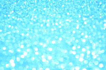 Beautiful Abstract Sparkle Glitter Lights Background. Sky Blue, Azure, Cerulean. Shine Bokeh Effect. For party, holidays, celebration.