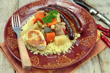 plate of royal couscous with lamb chicken and merguez