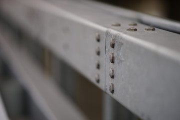 bolt caps on steel structure close up.