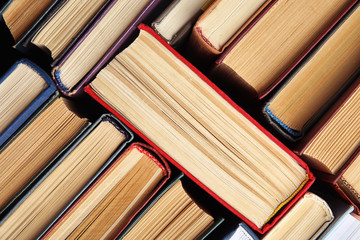 Naklejka premium Many different hardcover books as background, top view