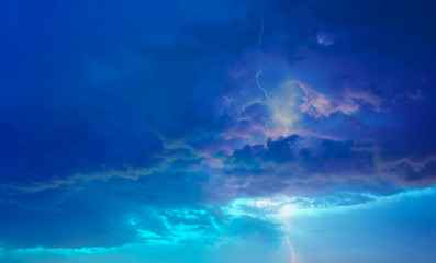 Fototapeta na wymiar Lightning thunderstorm flash over the sky