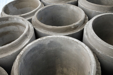 Stack of new concrete pipes.