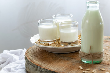 Fresh oat milk drink. Healthy nutritional ingredient, dairy themes
